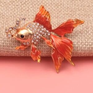 Elegant Gold and Orange Fish Brooch